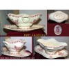 Ancienne sauciere en porcelaine Rouge opaque de Gien